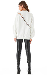 RIPPED DIAGONAL SAFETY PIN SWEATSHIRT