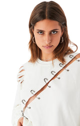 RIPPED DIAGONAL SAFETY PIN SWEATSHIRT